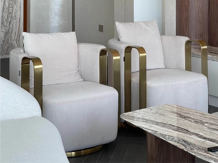 Bedroom with neutral tones and wall paneling