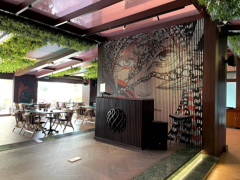 Private lounge with artistic wall décor and leather seating