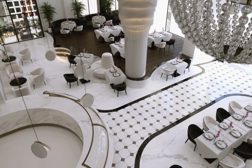 Private lounge with artistic wall décor and leather seating