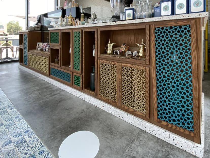 Private lounge with artistic wall décor and leather seating