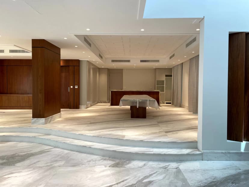 Private lounge with artistic wall décor and leather seating