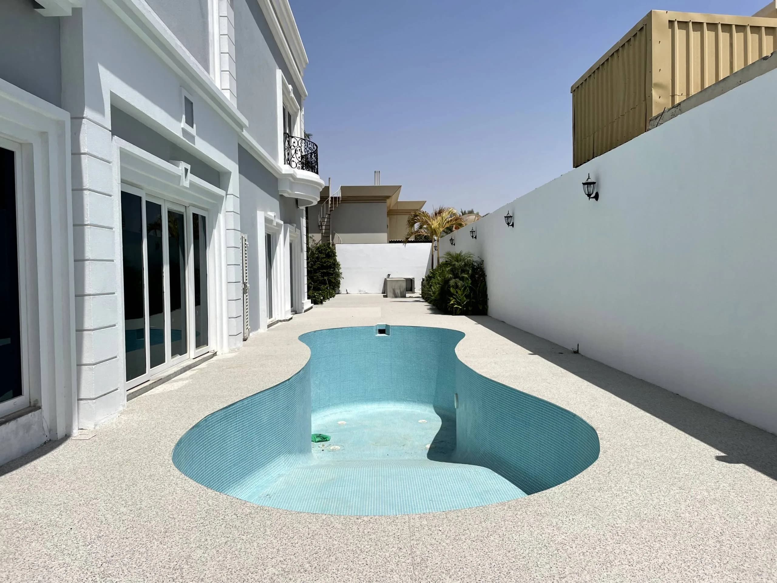 Luxury villa outdoor terrace and pool design in Dubai