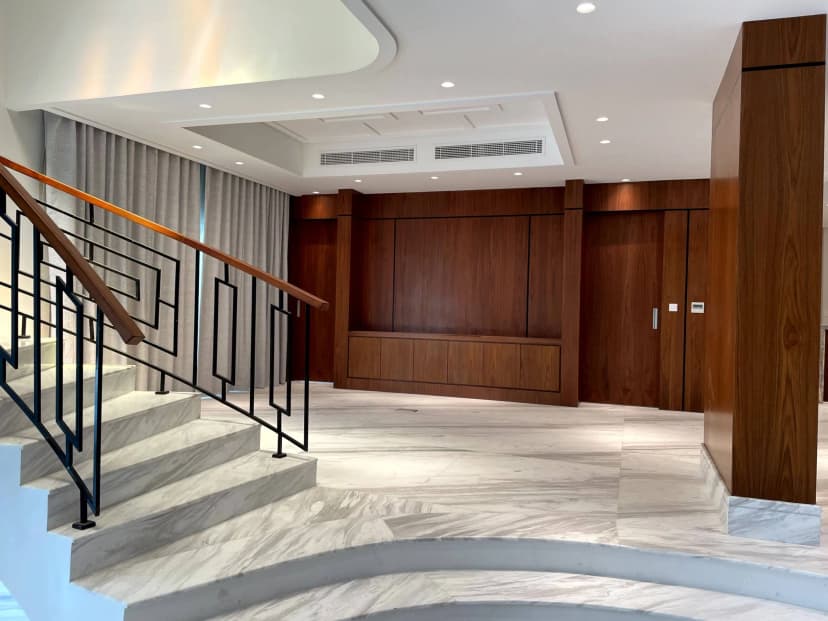 Private lounge with artistic wall décor and leather seating