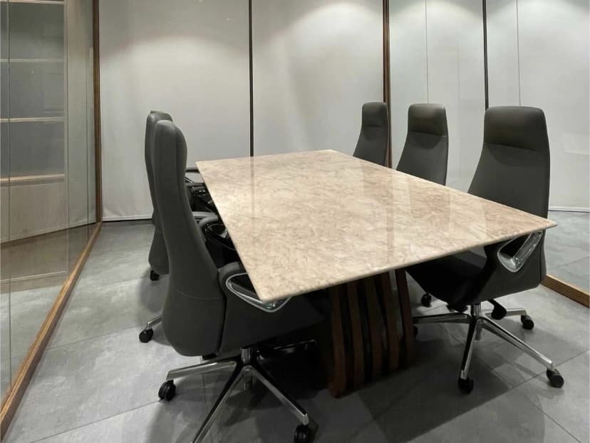 Private lounge with artistic wall décor and leather seating