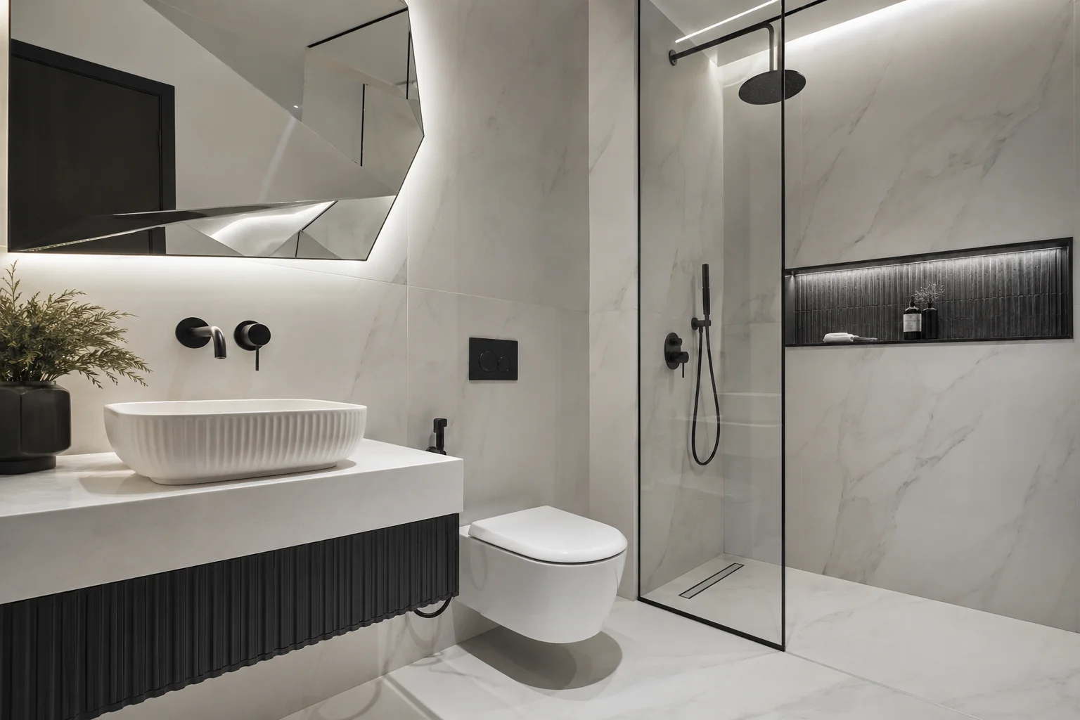 Wall-hung toilet, basin and frameless shower glass in a Dubai bathroom