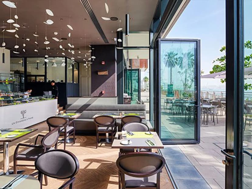 Private lounge with artistic wall décor and leather seating