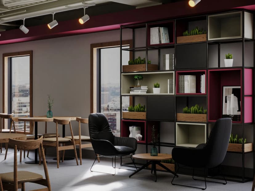 Private lounge with artistic wall décor and leather seating