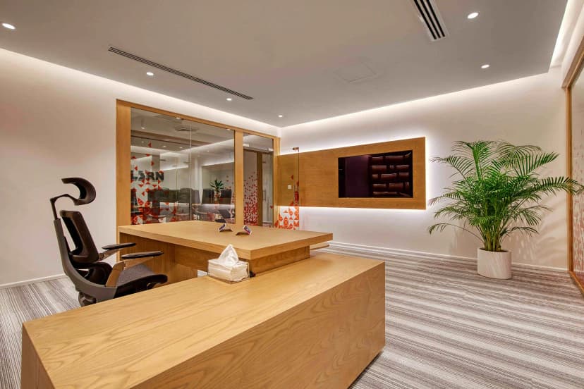 Private lounge with artistic wall décor and leather seating