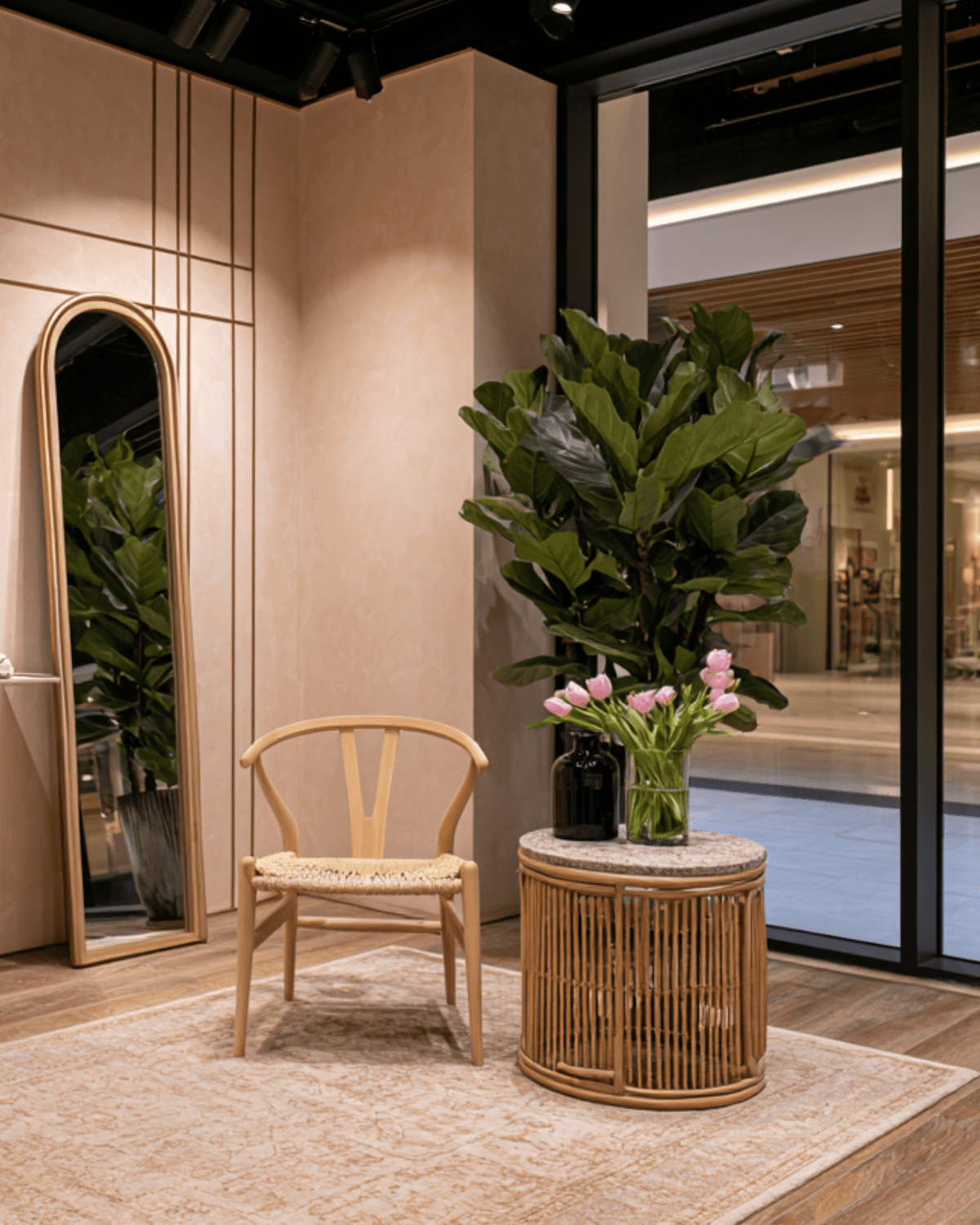 retail store clothing display with chair and flowers in creek harbour
