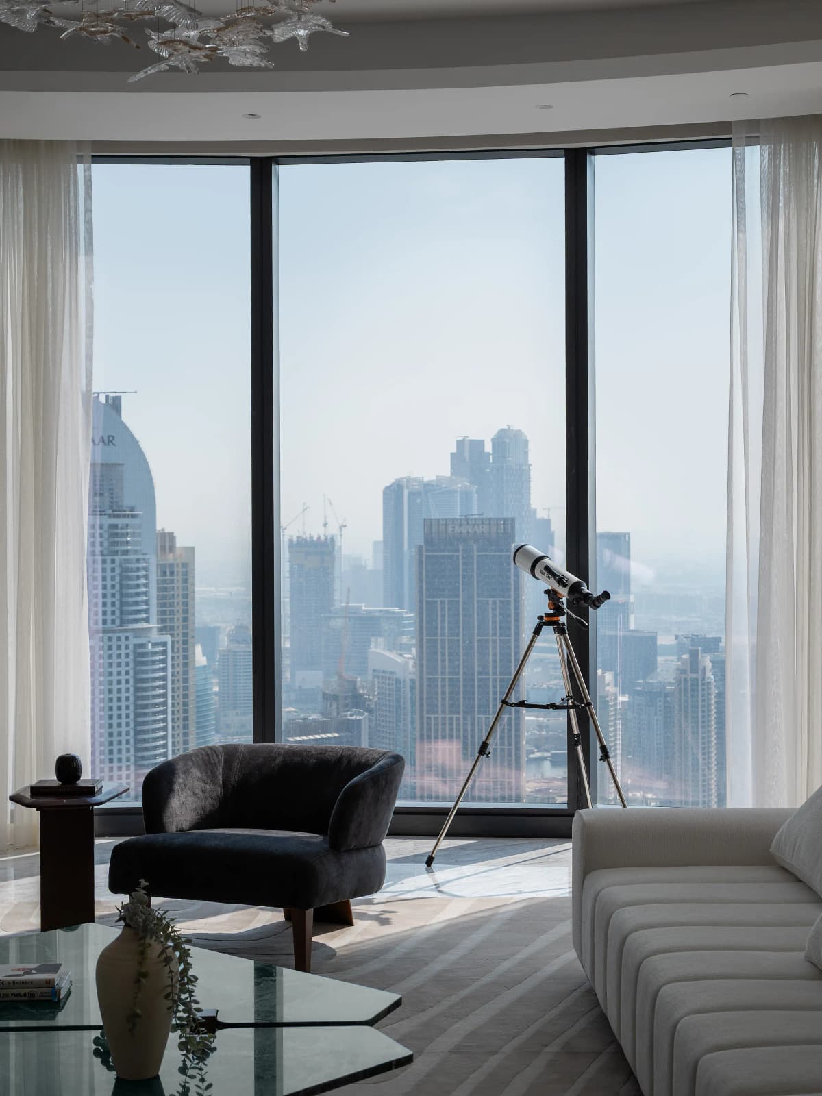 Penthouse bedroom outside dubai creek harbour views with sofa sitting